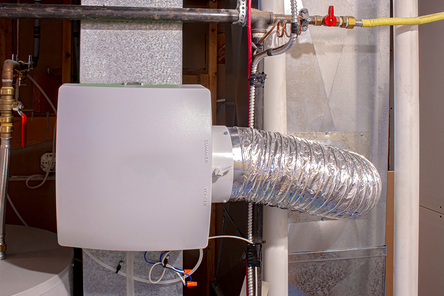 Whole-house humidifier installed on HVAC ductwork